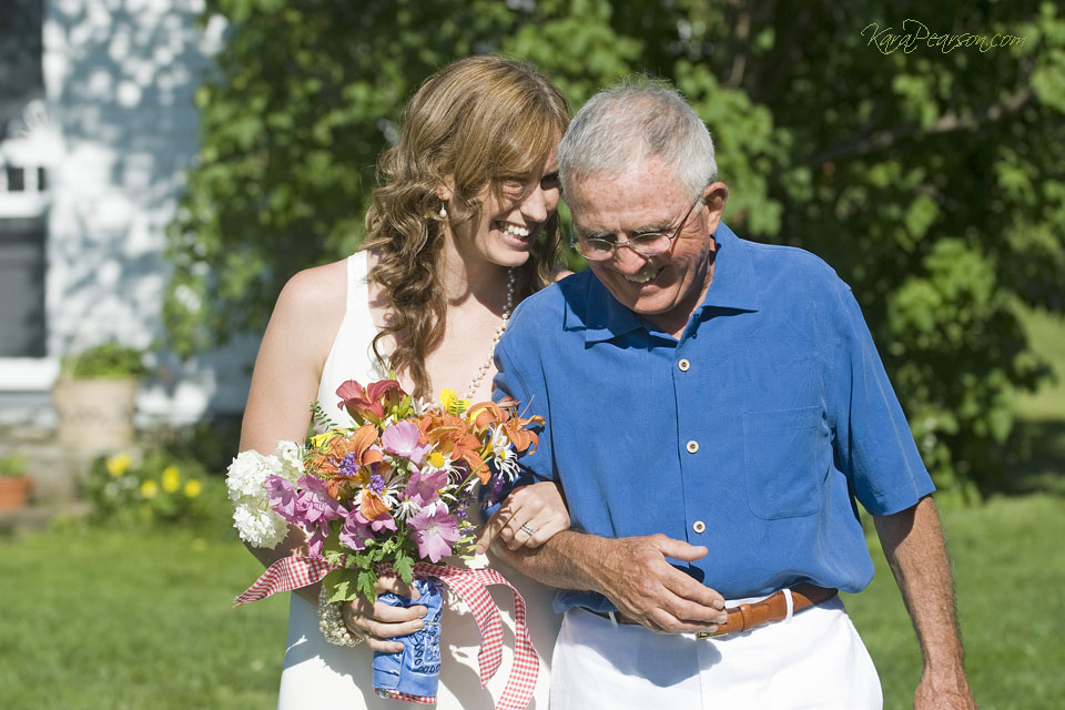 bride walks with dad