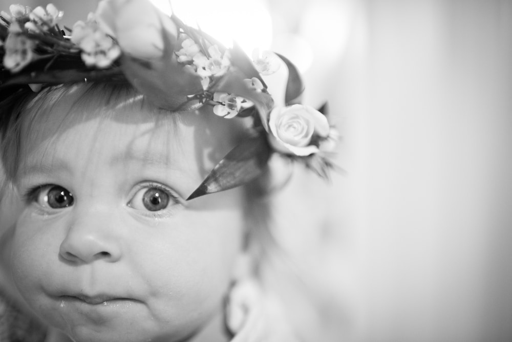 baby wearing a flower crown