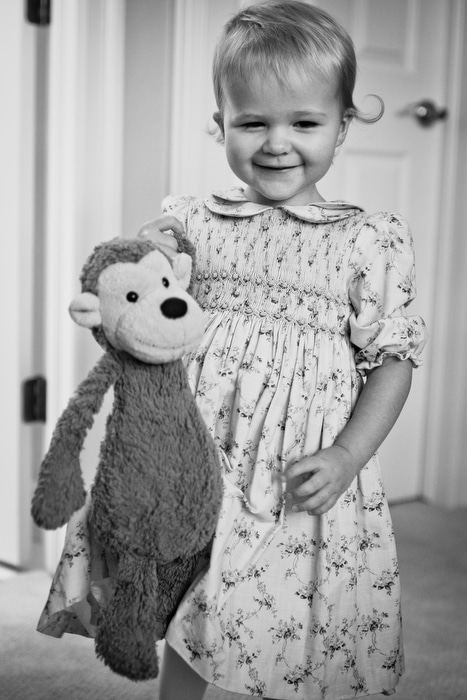 toddler holding monkey