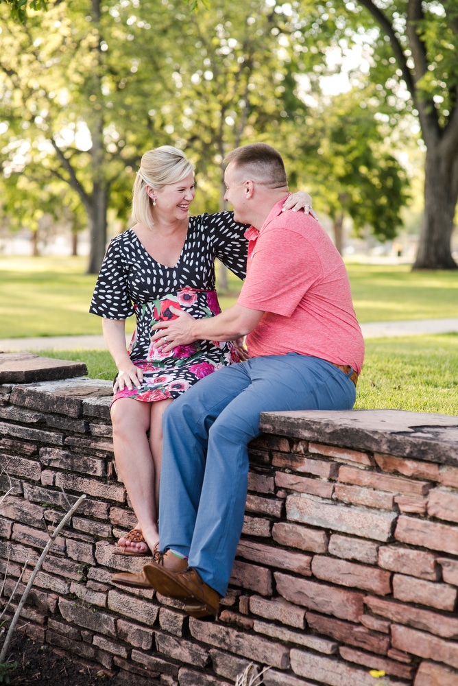 a couple laughs during their Wash Park maternity session