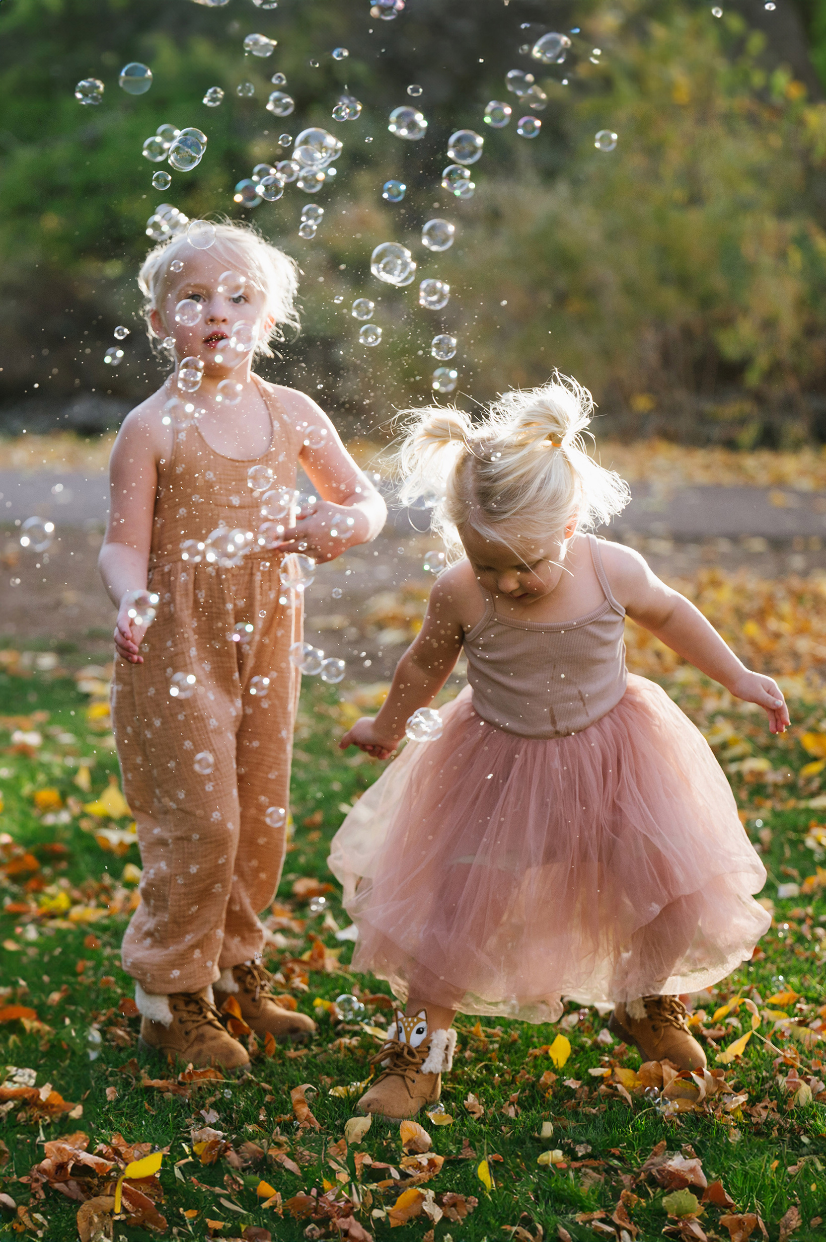 girls playing with bubbles